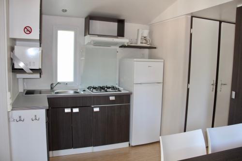 Camping Koawa Les Cigales - Family Classic 35m² - air-conditioning + TV - Photo 6