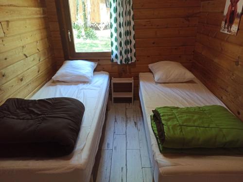 Camping LA TRUFFIERE à Saint Cirq Lapopie - The authentic wooden chalet with big terrace - Photo 9