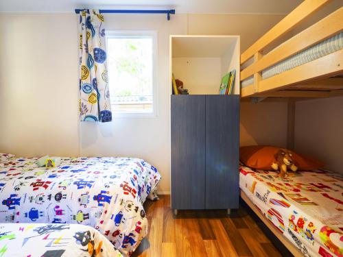 YELLOH! VILLAGE - Camping Les Cascades - Cottage Laurus ** (2 bedrooms + 1 bathroom + air-conditioning) - Photo 6