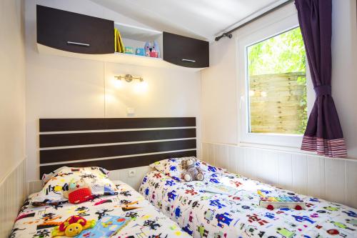 YELLOH! VILLAGE - Camping Les Cascades - Cottage Glycine *** (3 bedrooms + 1 bathroom + Air-conditioning) - Photo 7
