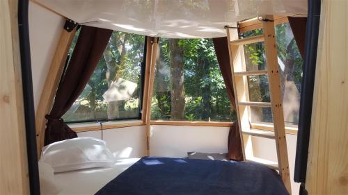 Camping Entre Terre et Mer - Wooden hut la Goutte d'ô - Photo 1