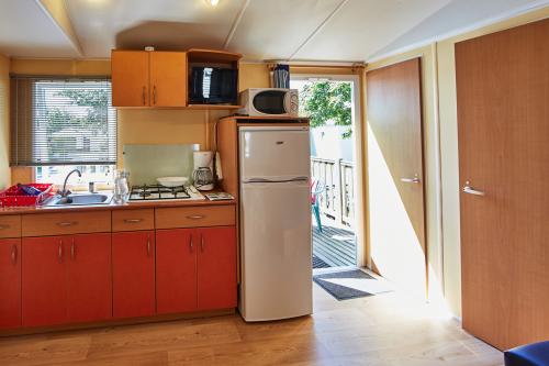 Flower Camping La Blanche Hermine - Mobil home Paimpol STANDARD 25m² (2 bedrooms - 4/6 people) + Covered terrace + TV - Photo 3