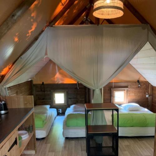 Flower Camping La Blanche Hermine - Lodge Breizh Koban CONFORT 19m² (sans sanitaires) (2ch-4pers) + Terrasse semi-couverte 10m² - Photo 2