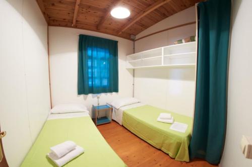 Camping Resort Els Pins - Bungalow Comfort Garden - Photo 4