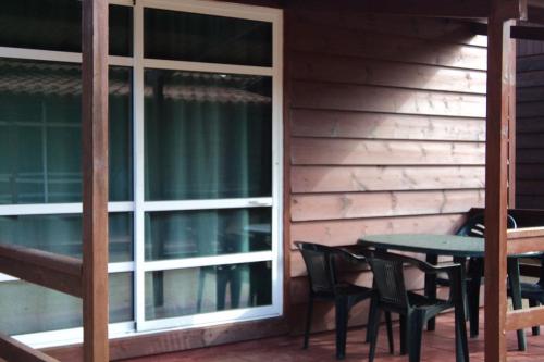 Camping Resort Els Pins - Bungalow Comfort Garden - Photo 7