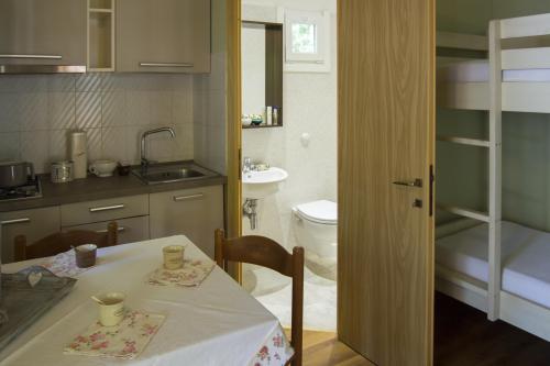 Camping Campo dei Fiori - Bungalow Quercianella - Photo 5