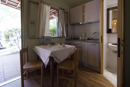 Camping Campo dei Fiori - Bungalow Quercianella - Photo 3