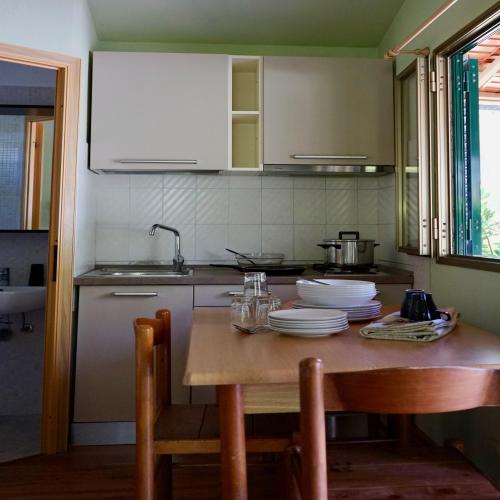 Camping Campo dei Fiori - Bungalow Quercianella - Photo 9