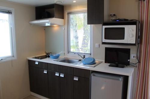Camping du Vieux Château - Mobilhome Escale 16m²- 1 bedroom + Television - Photo 3