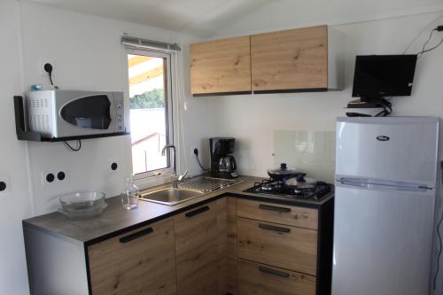 Camping du Vieux Château - Mobilhome Escapade Confort 27m² - 2 bedrooms + Television - Photo 3