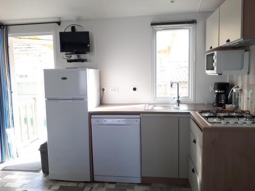 Camping du Vieux Château - Mobilhome Quietude CONFORT 35m² - 3 bedrooms + television and dishwasher - Photo 8