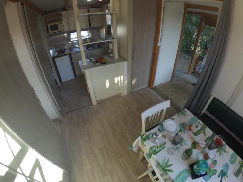 Camping Tikiti - Chalet gitotel club 25 m² / 2 bedrooms - Terrace - Sunday - Photo 9