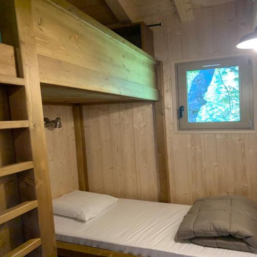 Camping Les Lanchettes - Chalet Ulysse 54m² 3 bedrooms + semi-covered terrace 24m² with Nordic bath - Photo 8