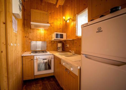 Camping Les Lanchettes - Chalet Vanoise 35 m² 2 bedrooms + terrace 15m² - Photo 5