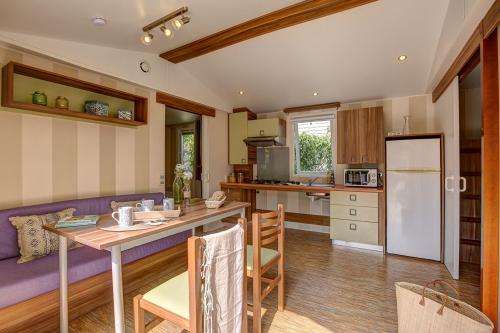 Camping Sandaya La Côte de Nacre - Cottage 2 bedrooms ** adapted to the people with reduced mobility - Photo 2