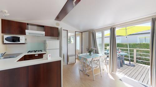 Camping Les Genêts - Mobile home Comfort 2 bdrs 31 m² - Photo 4