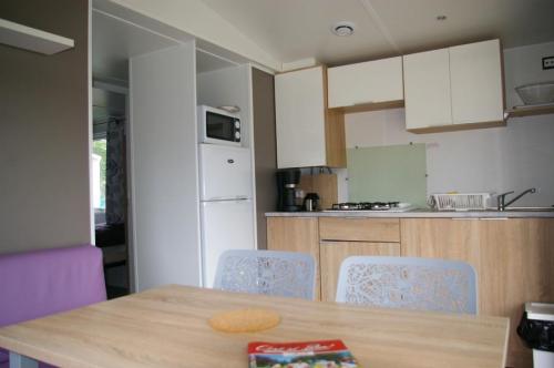 Camping LA BELLE ETOILE - Mobil-home ICAUNA - Photo 4