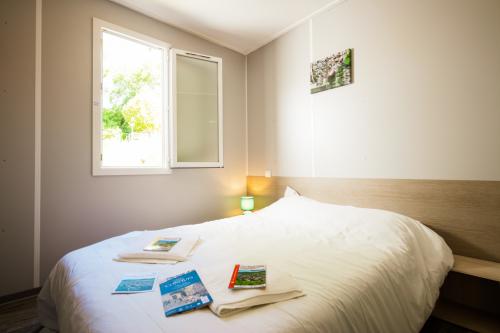 Camping Qualité le Val de Saures - Chalet 32m² / 2 bedrooms + sheltered terrace (TV + wifi) - Photo 7