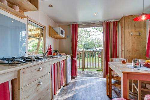 Camping Sandaya Sanguinet Plage - Gipsycar 2 bedrooms Unusual - Photo 6