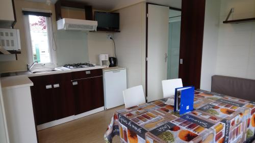 Camping L'Arada Parc - Mobil-home LE PLEIN AIR 2 bedrooms + sheltered terrace + TV + wifi - Photo 2