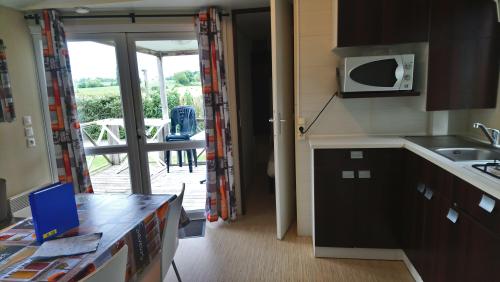 Camping L'Arada Parc - Mobil-home LE PLEIN AIR 2 bedrooms + sheltered terrace + TV + wifi - Photo 3