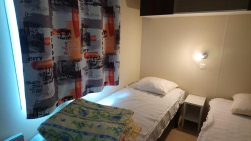 Camping L'Arada Parc - Mobil-home LE PLEIN AIR 2 bedrooms + sheltered terrace + TV + wifi - Photo 5