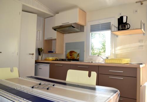 Camping Les Chênes - MOBILE HOME Éva 3X7m - Photo 2