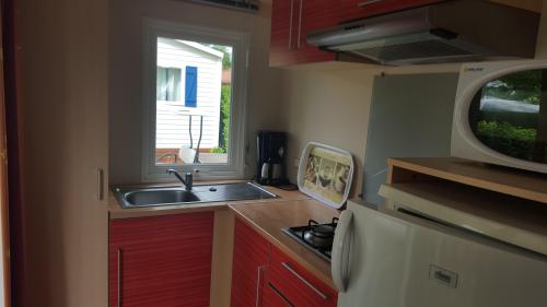 Base de Loisirs Cormoranche - mobil-home confort - Photo 2