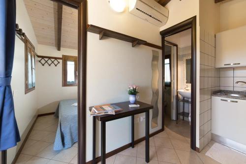 Camping Capo Ferrato - Bungalow Natura - Photo 3