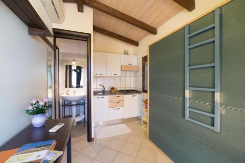 Camping Capo Ferrato - Bungalow Natura - Photo 6