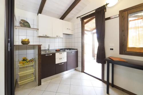 Camping Capo Ferrato - Bungalow Comfort - Photo 4