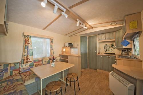 PARCO DELLE PISCINE - Mobilhome A 1 bathroom - Photo 1
