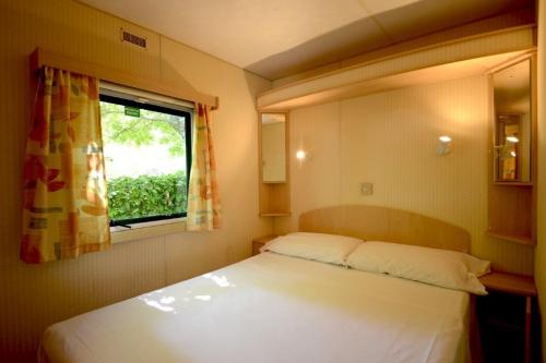 PARCO DELLE PISCINE - Mobilhome A 1 bathroom - Photo 7