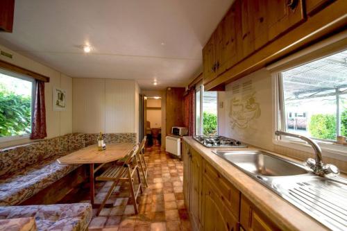 PARCO DELLE PISCINE - Mobilhome B 2 bathrooms - Photo 4