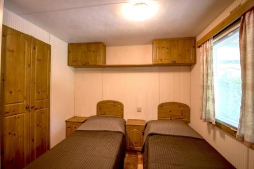 PARCO DELLE PISCINE - Mobilhome B 2 bathrooms - Photo 2
