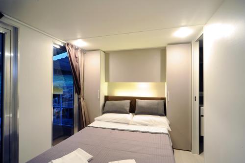 PARCO DELLE PISCINE - Mobilhome Lux 2 bathrooms - Photo 4