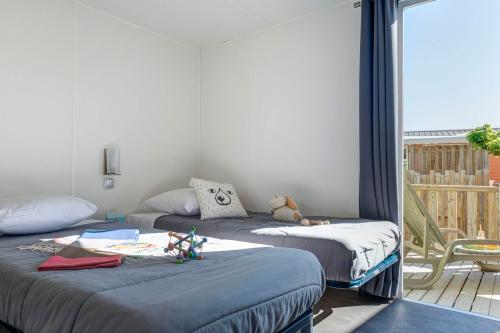 Camping Sandaya Les Tamaris - Cottage (2 bedrooms) air-conditioning + 2 bathrooms **** - Photo 7