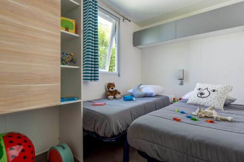 Camping Sandaya Les Tamaris - Cottage (3 bedrooms) + air-conditioning + 2 bathrooms **** - Photo 6