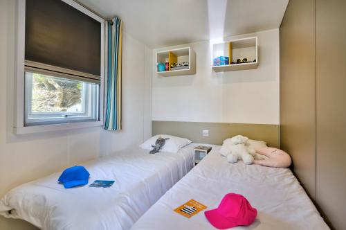 Flower Camping Les Paludiers - Mobile home Premium 30m² (2 bedrooms) + half-covered terrace + TV + Sheets - Photo 7