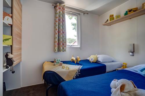 Camping Californie Plage - Mobile home CAYO COCO Supérieur about 27m² 2 rooms + terrace with pergola - Photo 8