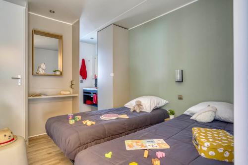 Camping Sandaya Blue Bayou - Cottage Carmin 2 bedrooms air-conditioning Premium - Photo 7