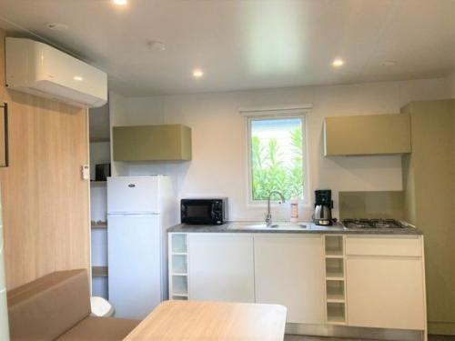 Koawa Camping Beau Rivage - Family Premium 27m² - air-conditioning + TV - Photo 3