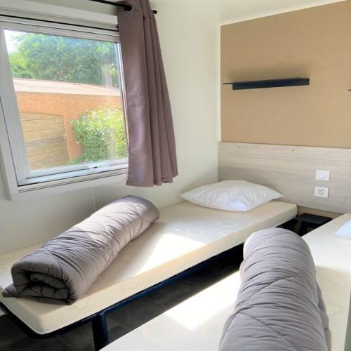 Koawa Camping Beau Rivage - Family Luxe 24m² - Jacuzzi - air-conditioning + TV - With sheets - Photo 8