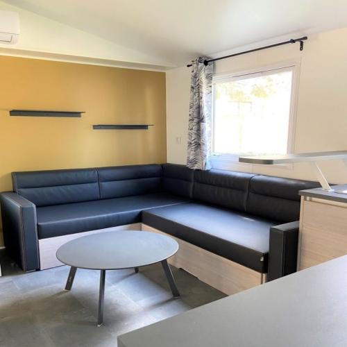 Koawa Camping Beau Rivage - Espace Premium 32m² - garden view - Klimaanlage + TV - Photo 5