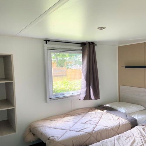 Koawa Camping Beau Rivage - Espace Premium 32m² - garden view - Klimaanlage + TV - Photo 8