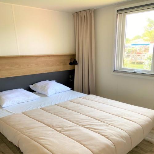 Koawa Camping Beau Rivage - Bay Premium 32m² - garden view - Klimaanlage + TV - Photo 6