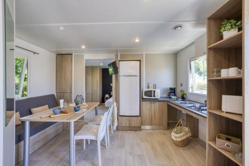 Camping Sandaya L'Anse du Brick - Cottage 2 bedrooms Seaview - adapted to the people with reduced mobility *** - Photo 4