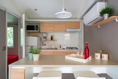 Camping Sandaya Les Peneyrals - Cottage ELLIONE 2 bedrooms air conditionning *** - Photo 4