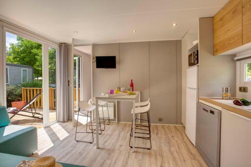 Camping Sandaya Les Peneyrals - Cottage 2 bedrooms 2 bathrooms - air-conditioning **** - Photo 3