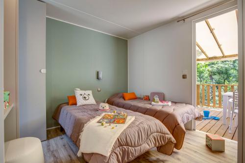 Camping Sandaya Les Peneyrals - Cottage 2 bedrooms 2 bathrooms - air-conditioning **** - Photo 6